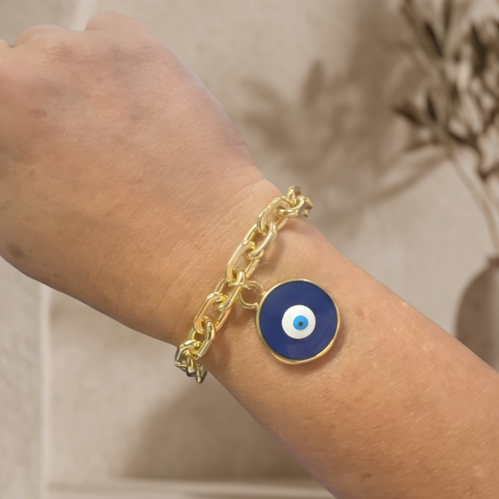 Élan Link gold oval chain bracelet with blue evil eye charm